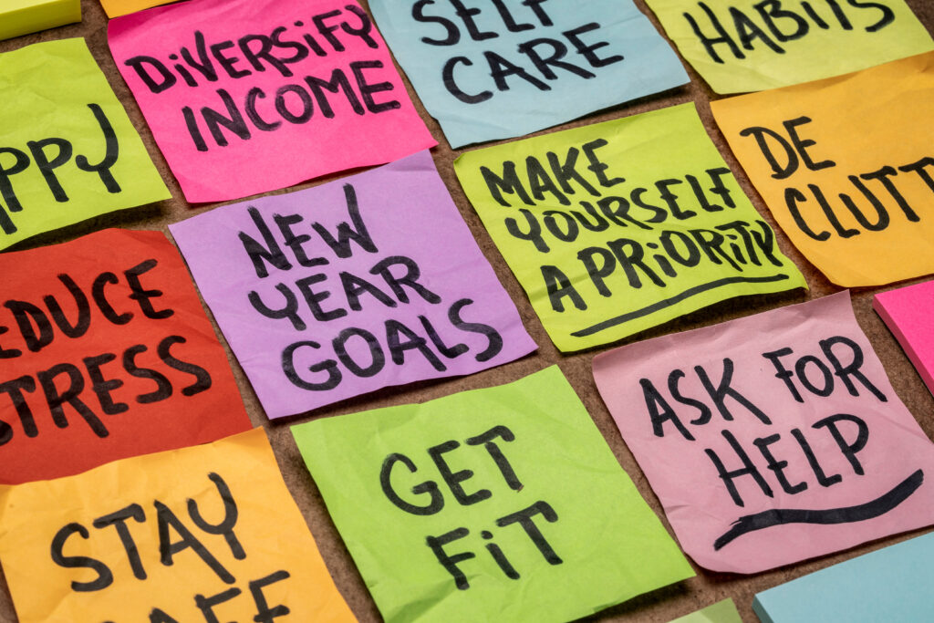 new year goals and resolutions - set of colorful sticky notes